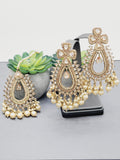 "Radiant Reverie: The Reverse Ad Tikka Earrings Set Ensemble"