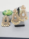"Radiant Reverie: The Reverse Ad Tikka Earrings Set Ensemble"