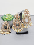 "Radiant Reverie: The Reverse Ad Tikka Earrings Set Ensemble"