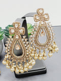 "Radiant Reverie: The Reverse Ad Tikka Earrings Set Ensemble"
