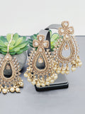 "Radiant Reverie: The Reverse Ad Tikka Earrings Set Ensemble"