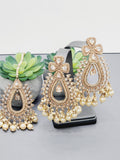 "Radiant Reverie: The Reverse Ad Tikka Earrings Set Ensemble"