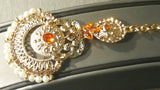 Very Elegant Orange Die Cast Metal With Pearls & Jarkan Tikka Earrings Set.
